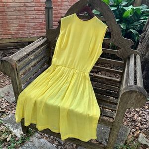 Yellow pleated dress